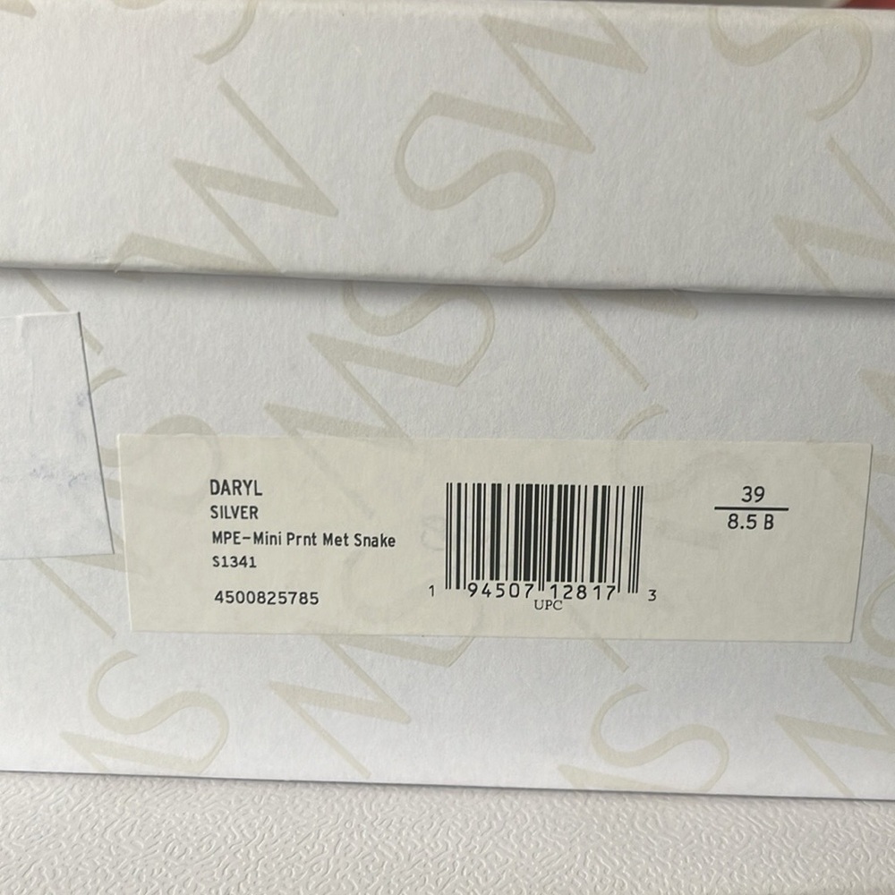 Daryl Silver snake print brand new comes with Dust Bag